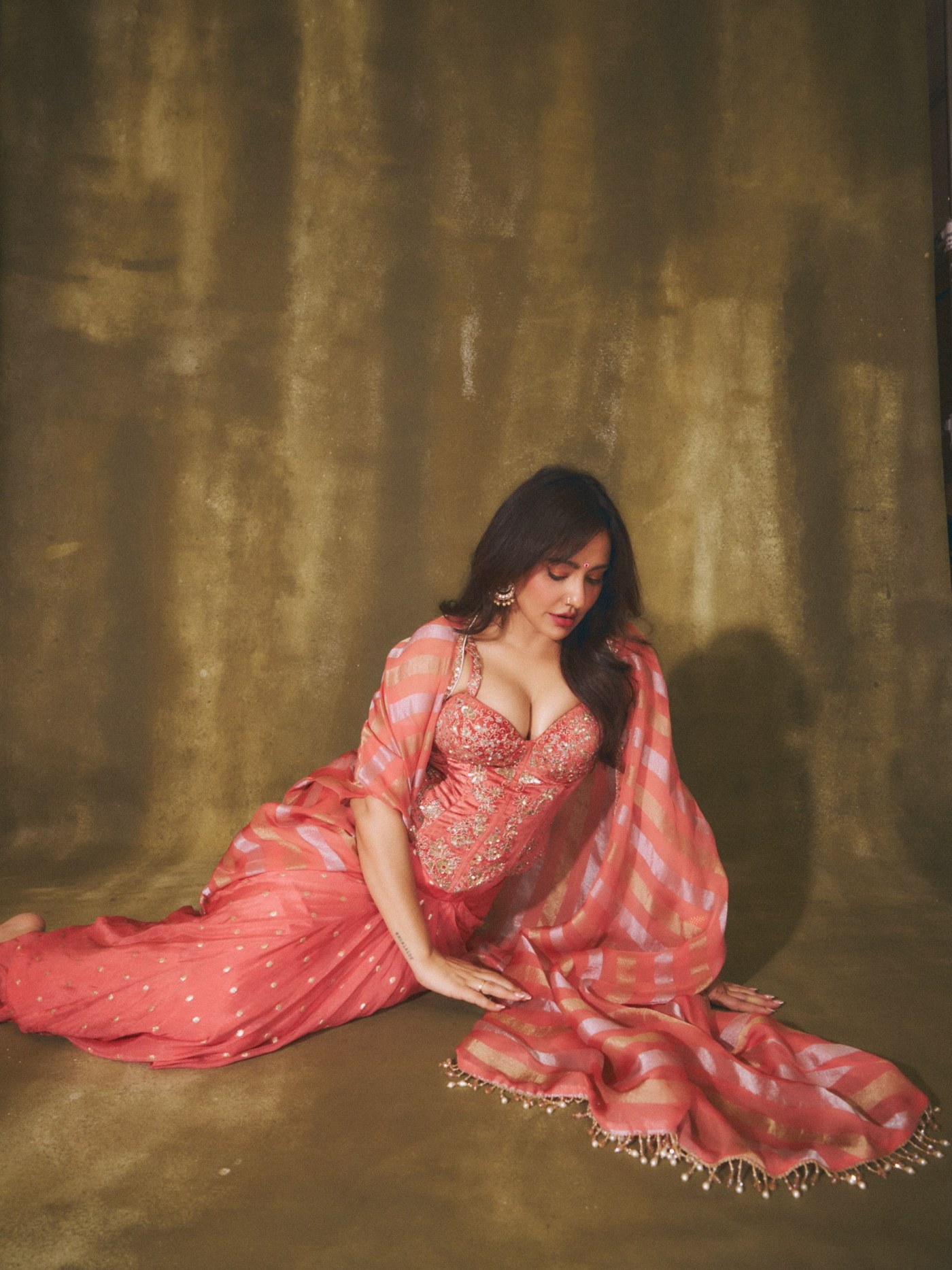 Neha Sharma Masters Festive Fashion with Coral and Gold Stripes