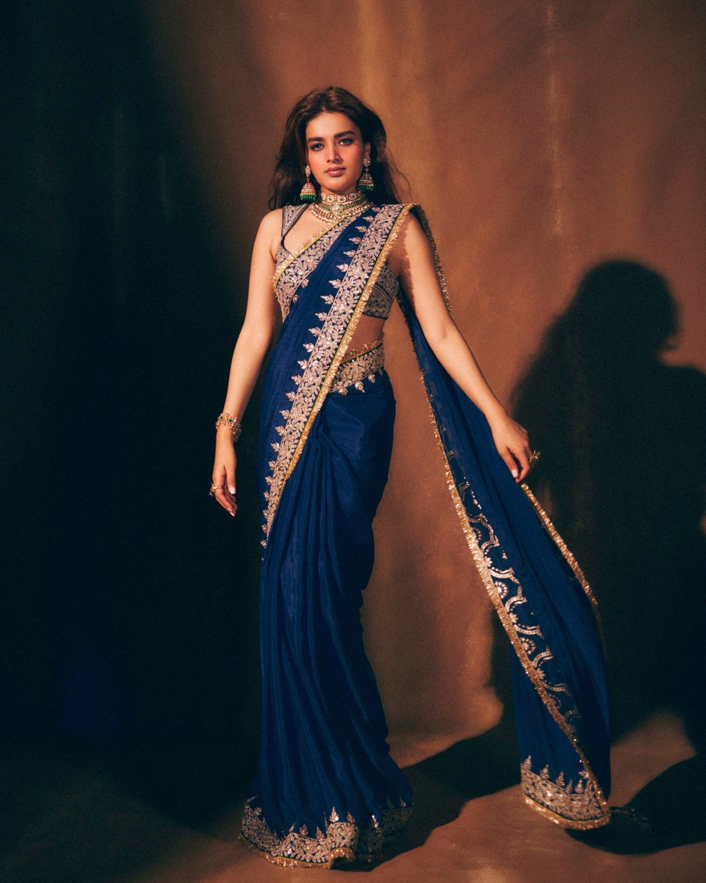Nidhhi Agerwal's Royal Blue Saree Captivates Hearts with Maharani Elegance
