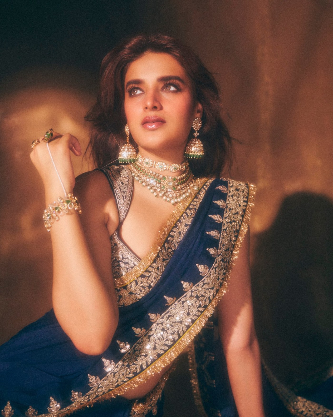 Nidhhi Agerwal's Royal Blue Saree Captivates Hearts with Maharani Elegance