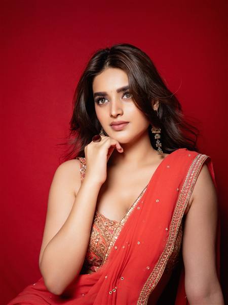 Red Hot Goddess! Nidhi Agarwal Steals Hearts in Stunning Traditional Look