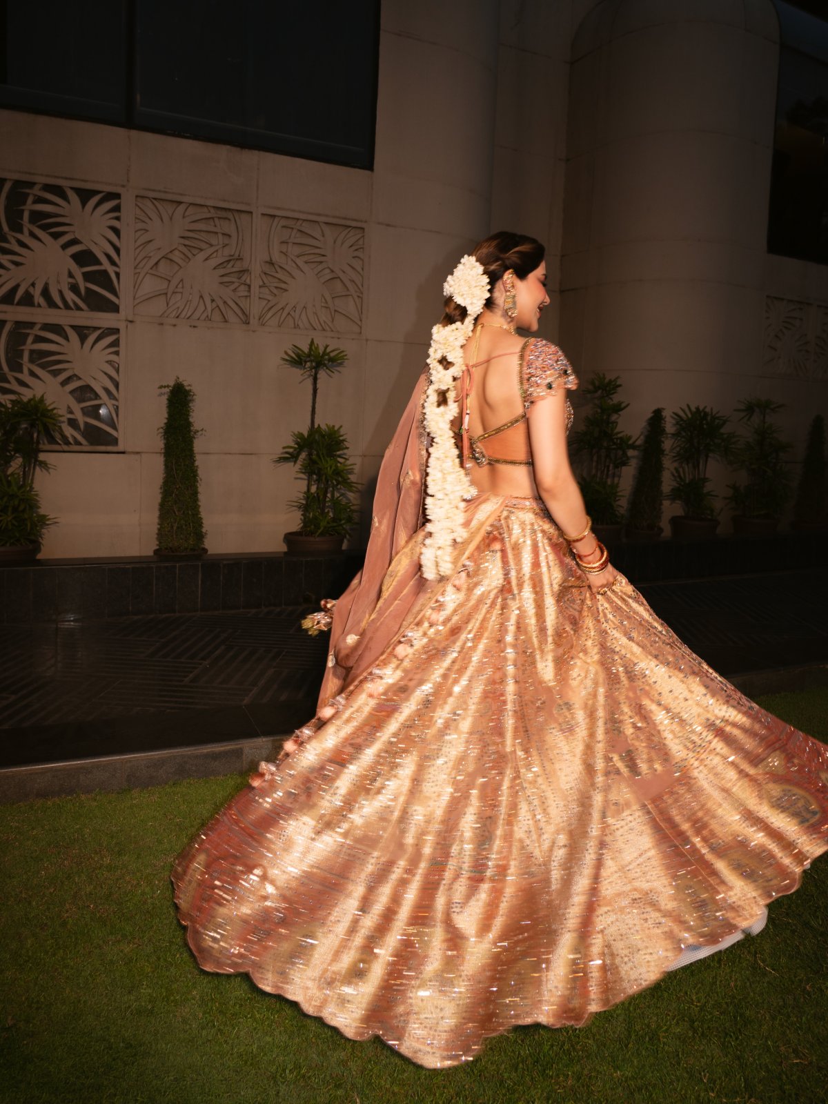 Peach Lehenga Paired With Green Stone Jewellery