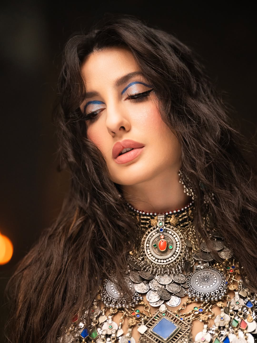 Nora Fatehi's Dazzling Metallic Glamour: A Photo Gallery