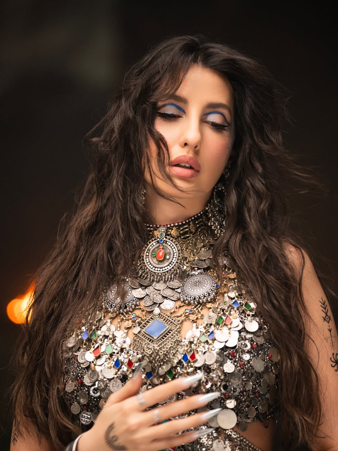 Nora Fatehi's Dazzling Metallic Glamour: A Photo Gallery