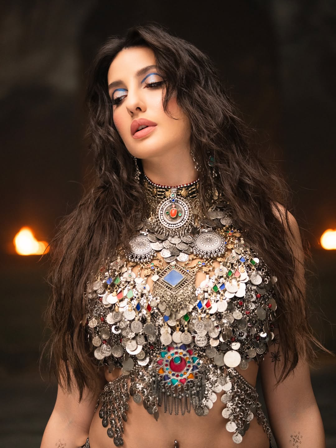 Nora Fatehi's Dazzling Metallic Glamour: A Photo Gallery