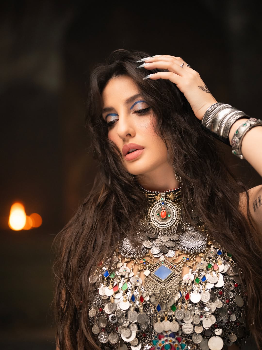 Nora Fatehi's Dazzling Metallic Glamour: A Photo Gallery