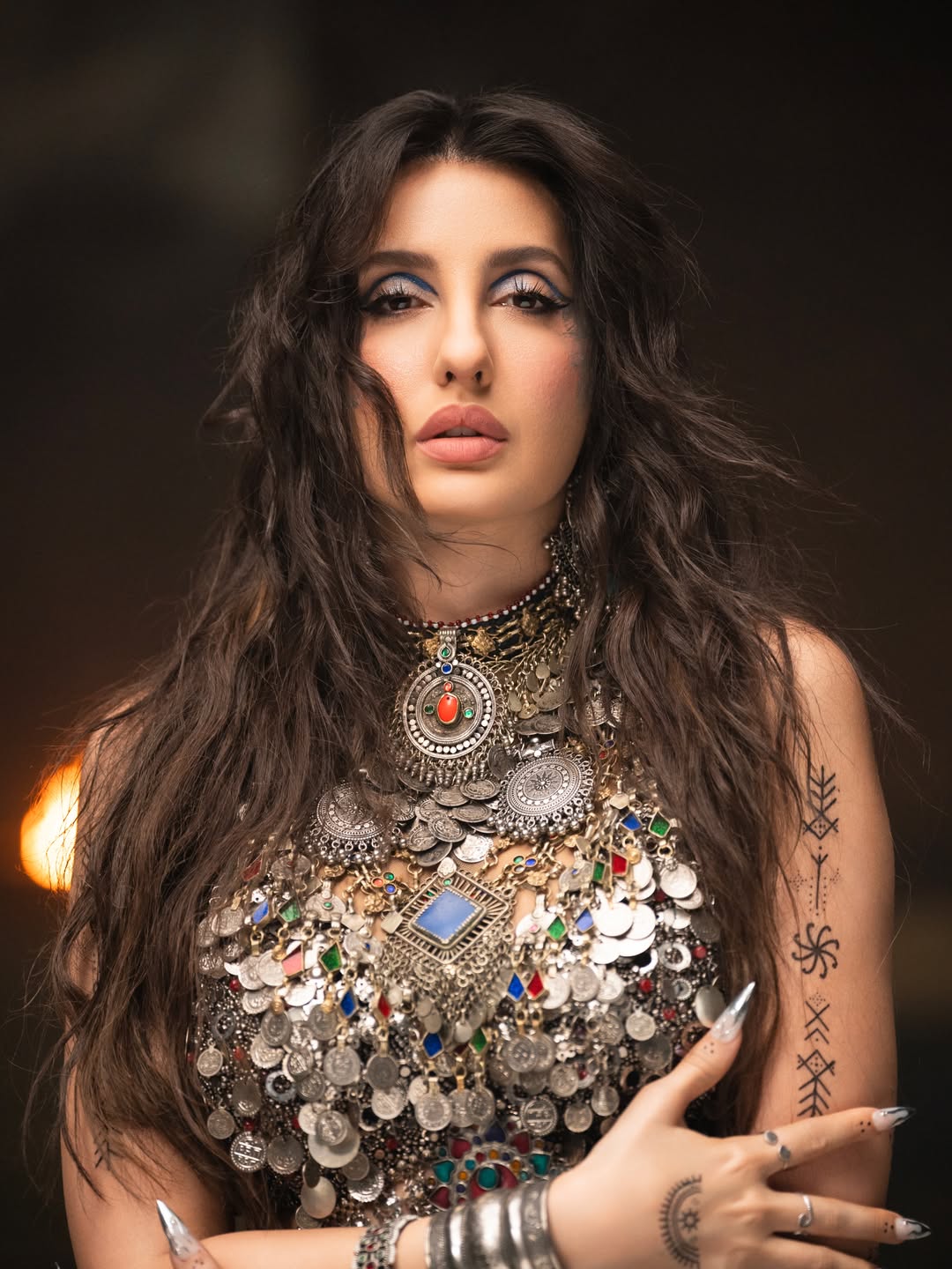 Nora Fatehi's Dazzling Metallic Glamour: A Photo Gallery