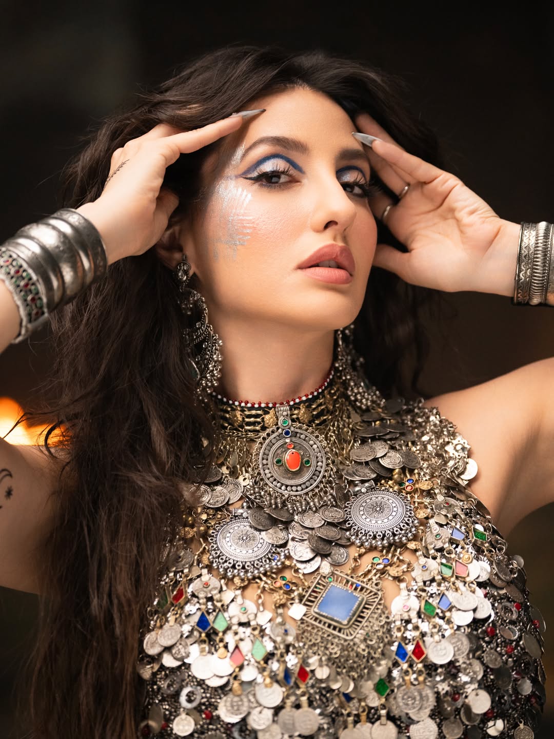 Nora Fatehi's Dazzling Metallic Glamour: A Photo Gallery