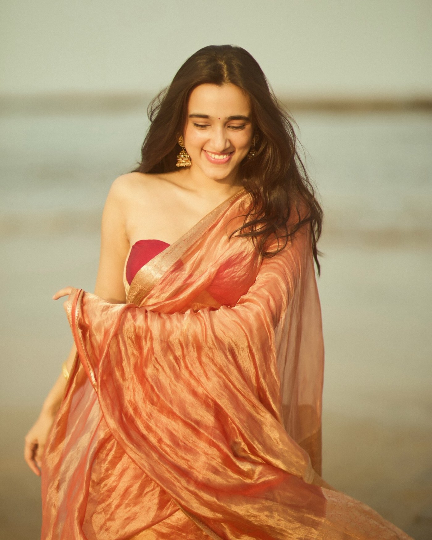 Nuveksha’s Royal Copper Glow: Mastering Glamour on the Shoreline