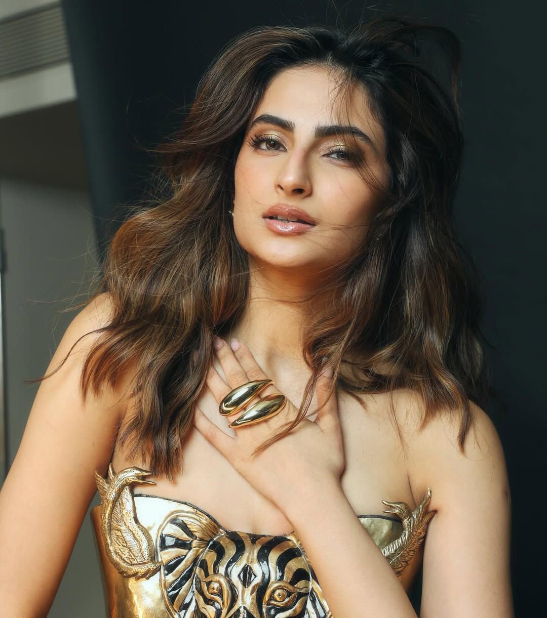 Palak Tiwari's Golden Glamour: A Stunning Photo Set