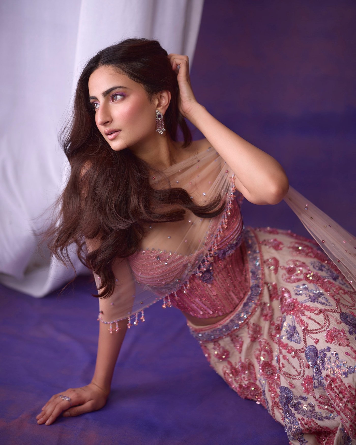 Palak Tiwari showcases a stunning pastel pink and lavender embroidered ethnic ensemble at a festive occasion. - Photos & Updates