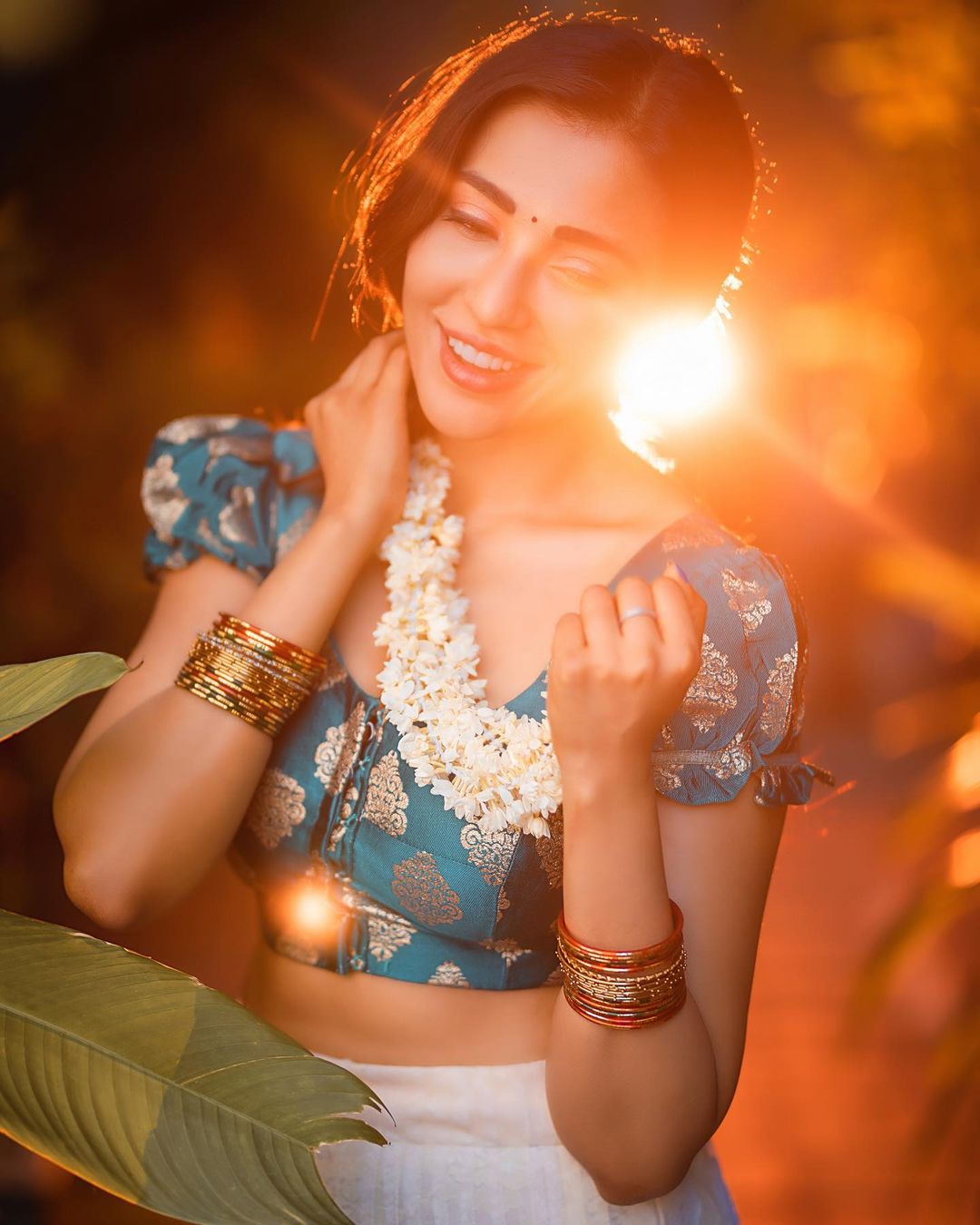 Golden Hour Glow: Parvati Nair's Ethereal Beauty
