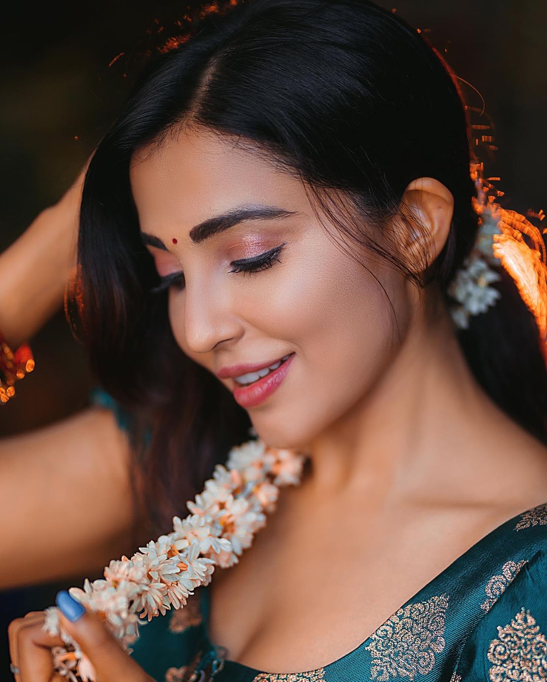 Golden Hour Glow: Parvati Nair's Ethereal Beauty