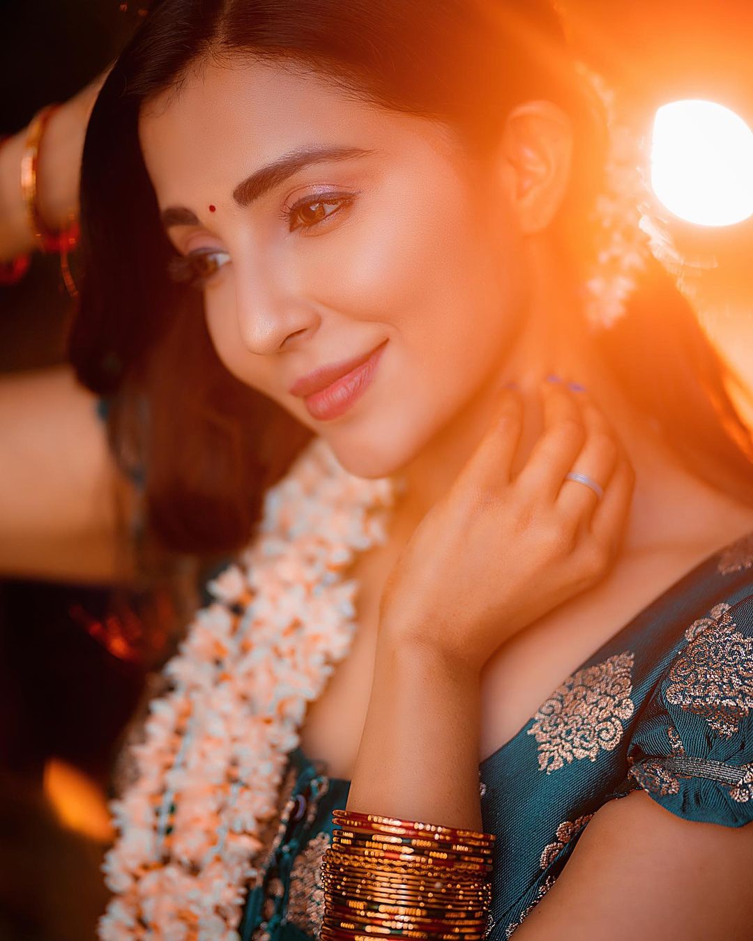 Golden Hour Glow: Parvati Nair's Ethereal Beauty