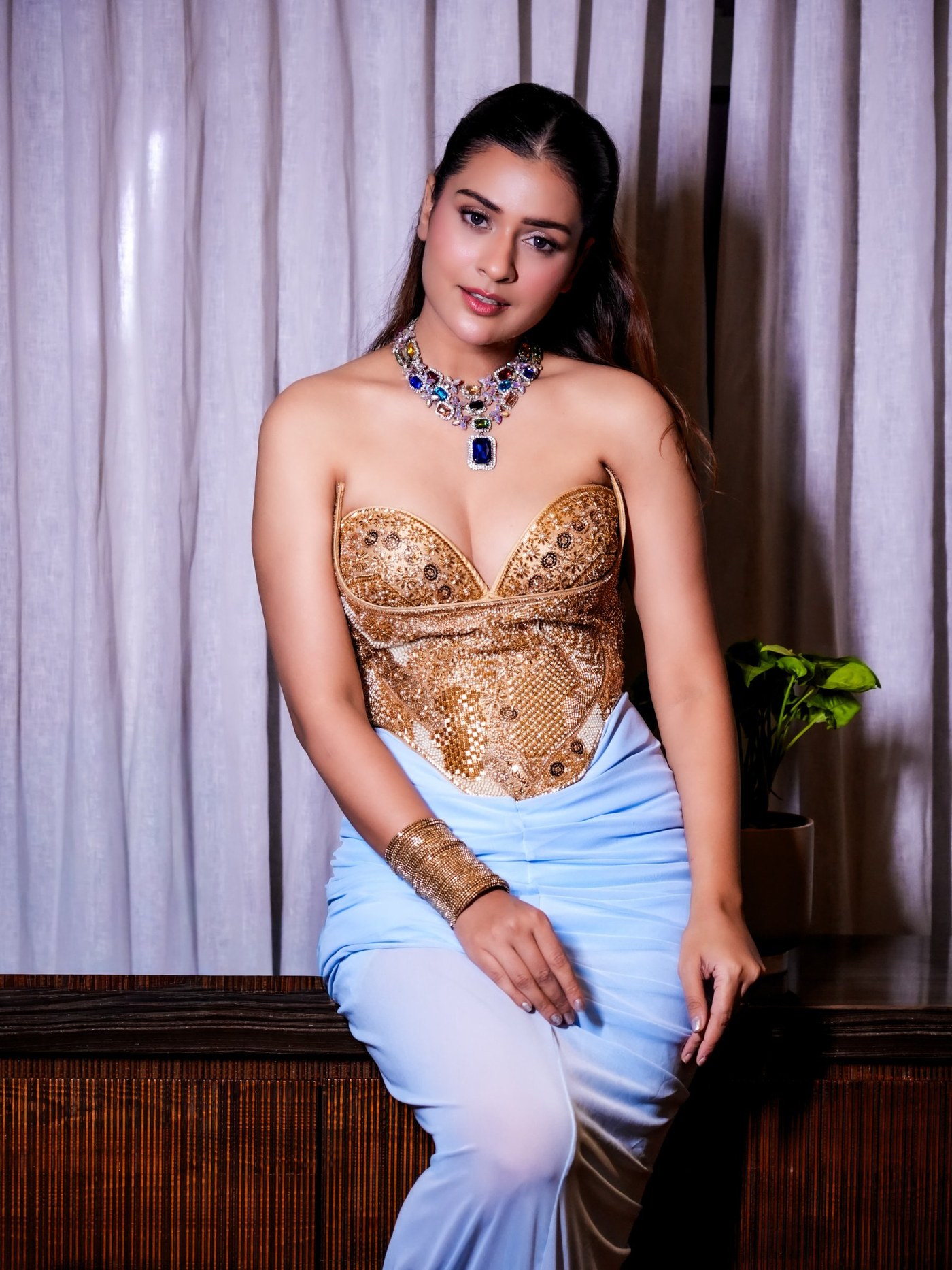 Payal Rajput Masters the Art of Structured Drape in Gold and Blue