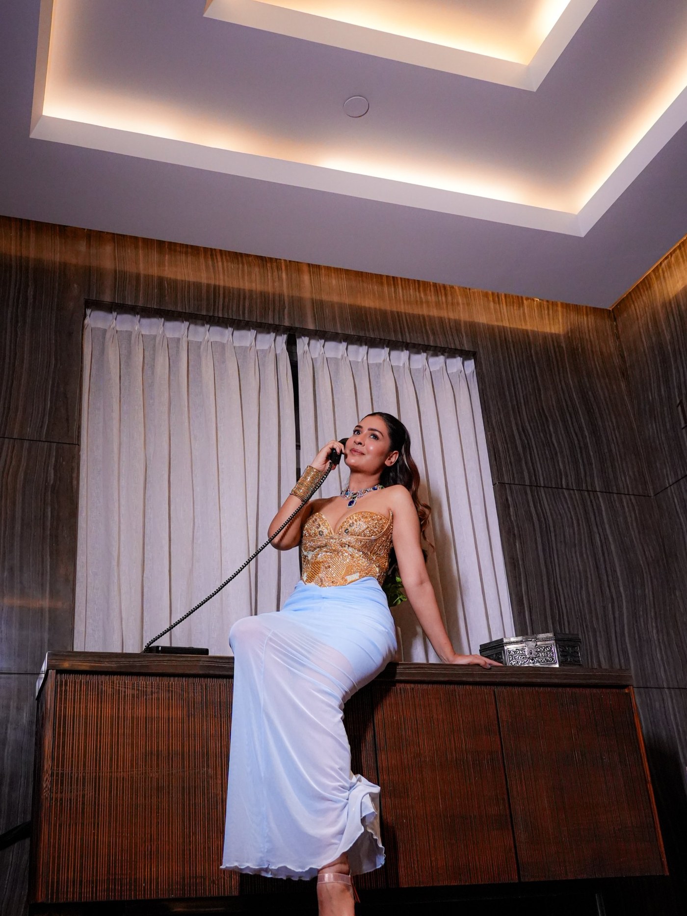 Payal Rajput Masters the Art of Structured Drape in Gold and Blue