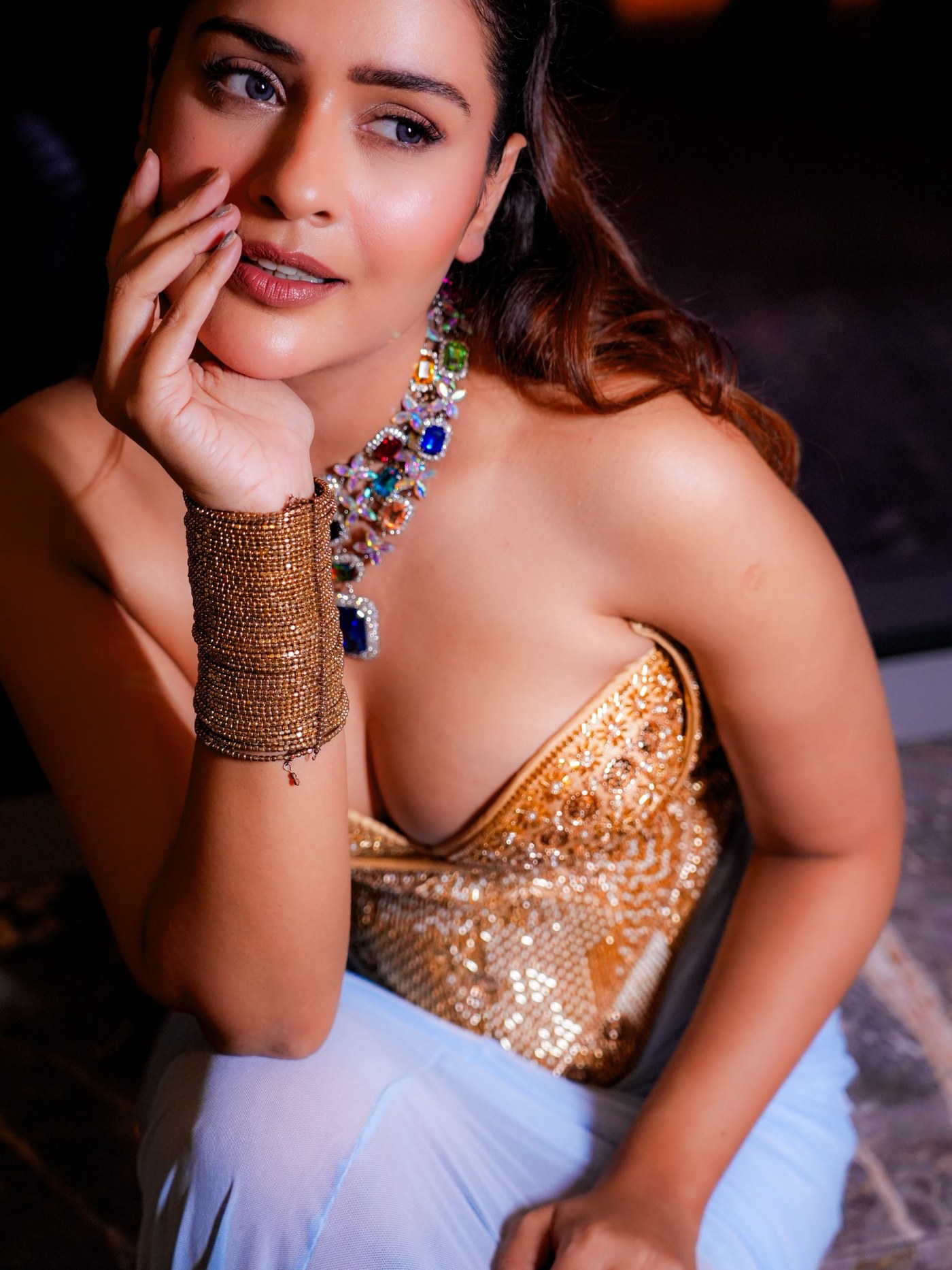 Payal Rajput Masters the Art of Structured Drape in Gold and Blue