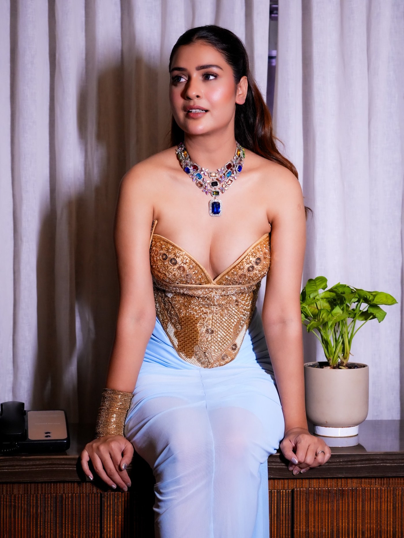Payal Rajput Masters the Art of Structured Drape in Gold and Blue