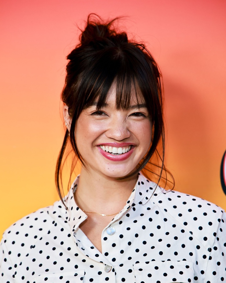 Peyton Elizabeth Lee is seen attending a premiere event, radiating confidence and style on the red carpet.