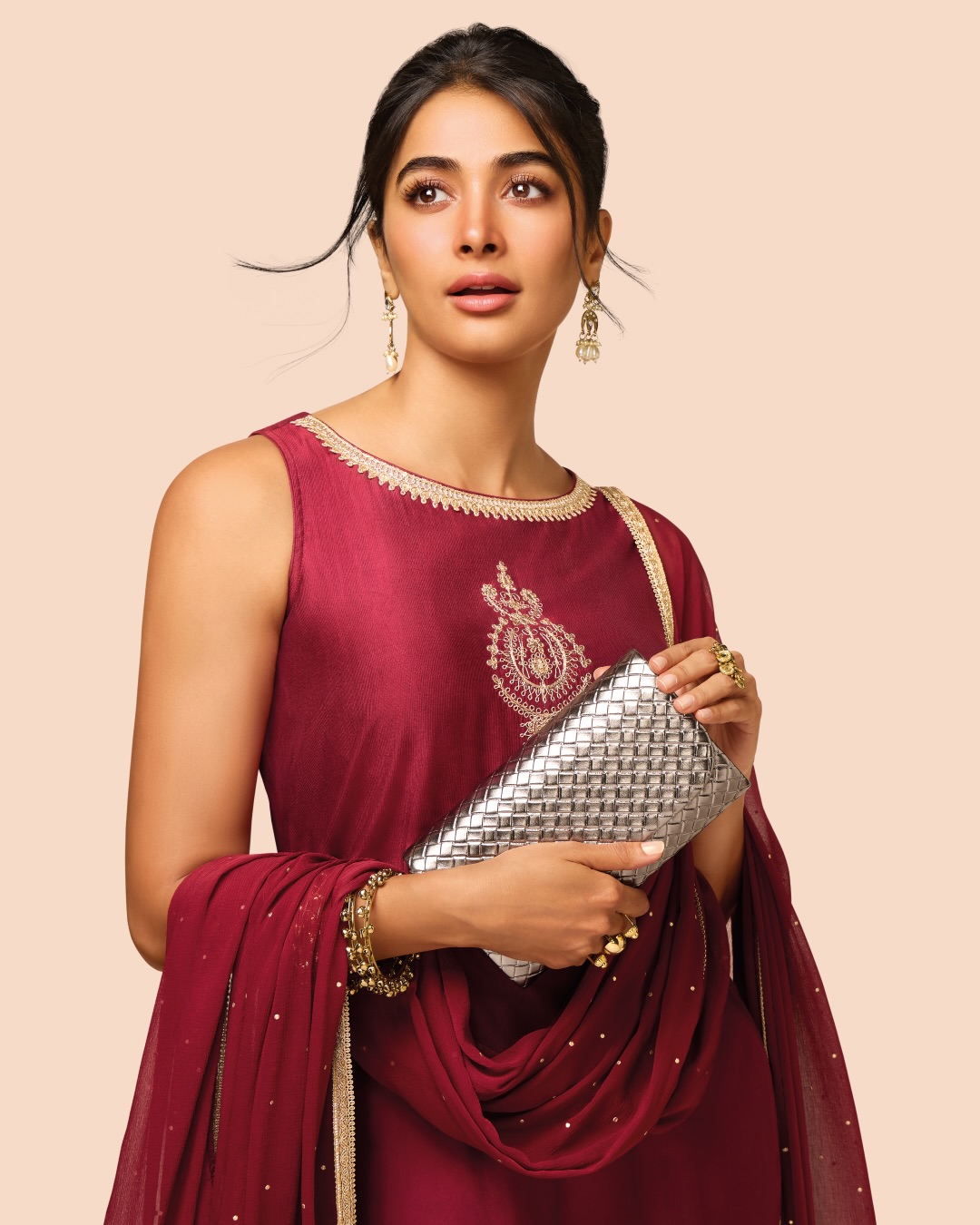 Pooja Hegde's Festive Launch: Teal and Maroon Takes Center Stage