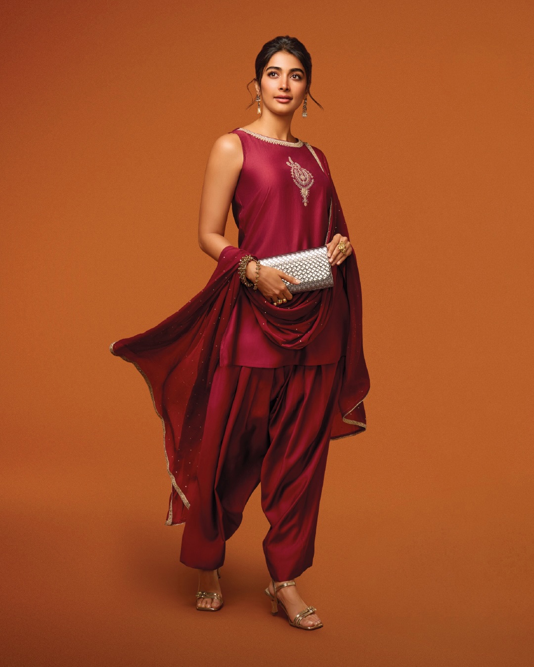 Pooja Hegde's Festive Launch: Teal and Maroon Takes Center Stage