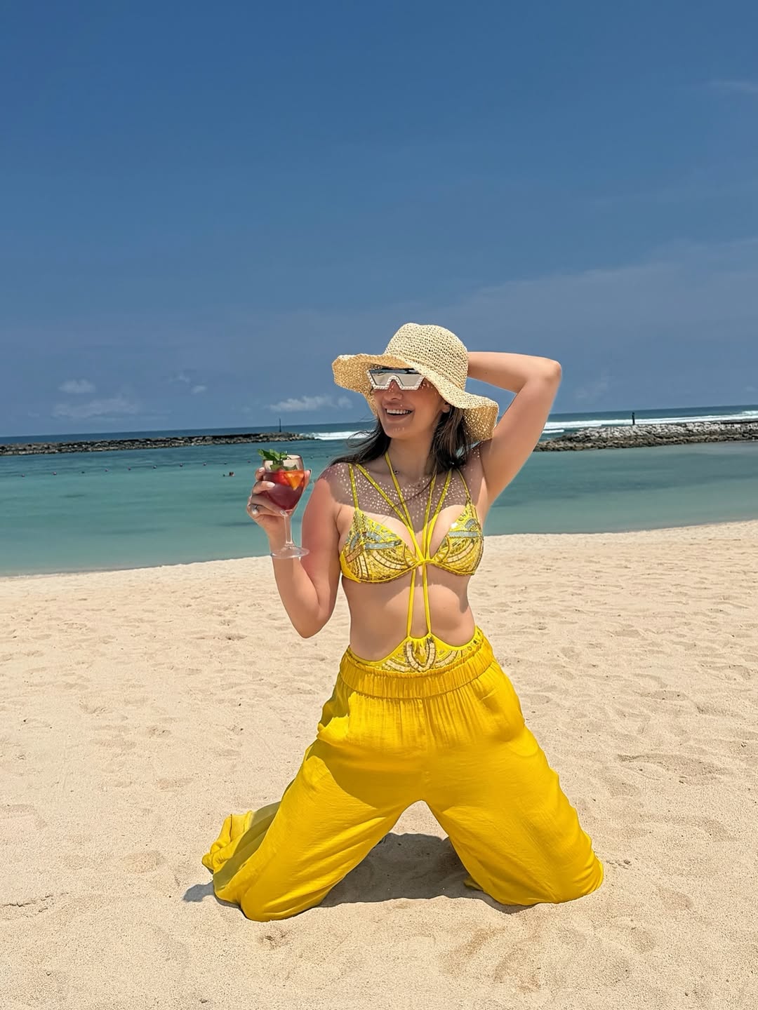 Raai Laxmi's Bold Yellow Beach Look Redefines Summer Glamour