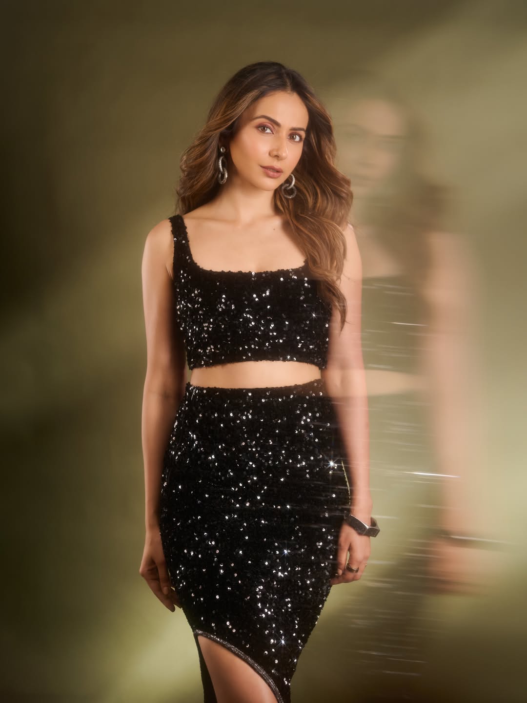 Rakul Preet Singh showcases a dazzling black sequin two-piece ensemble, radiating confidence and glamour.