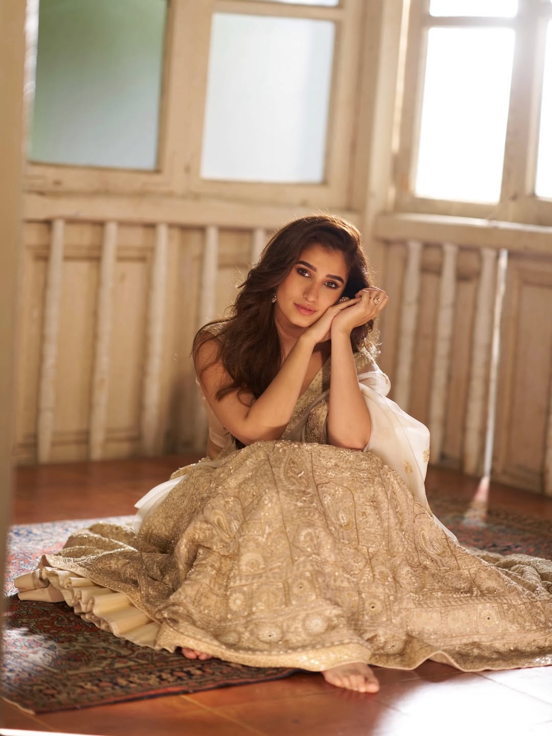 Rasha Thadani posing confidently at a lavish evening event, showcasing elegant attire.
