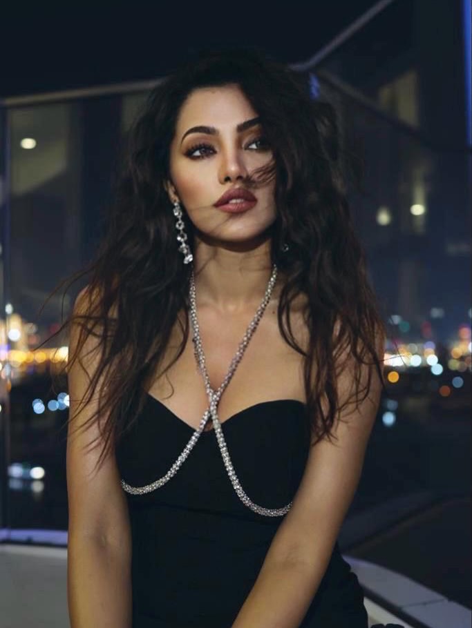 Ananya Raj's Stunning Versatility: From Beach Chic to Studio Glamour