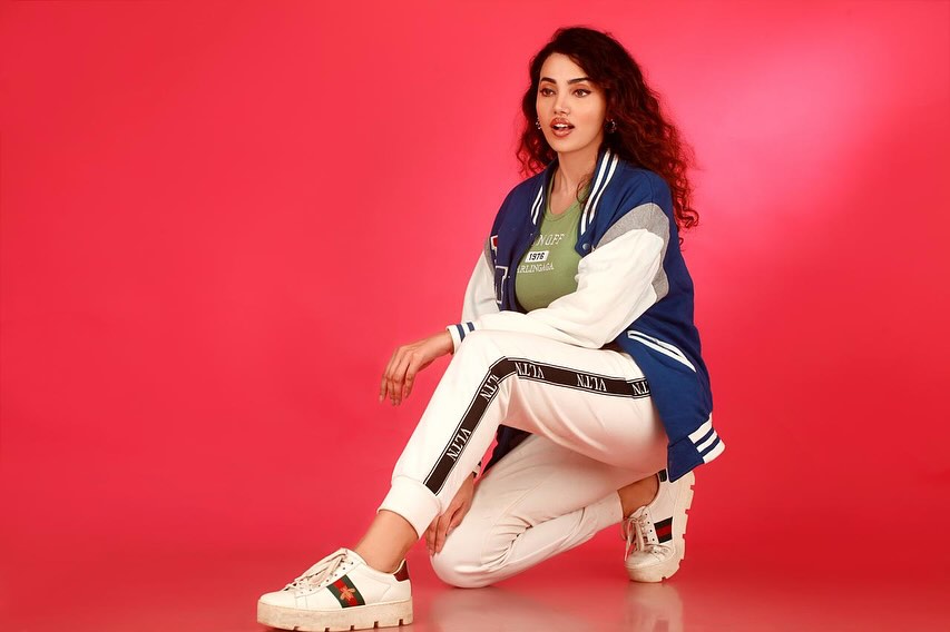 Ananya Raj's Stunning Versatility: From Beach Chic to Studio Glamour