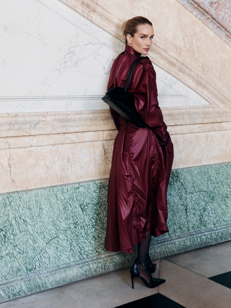 Rosie Huntington Whiteley poses elegantly at a high-profile event, showcasing stunning poise and glamour. - Photos & Updates