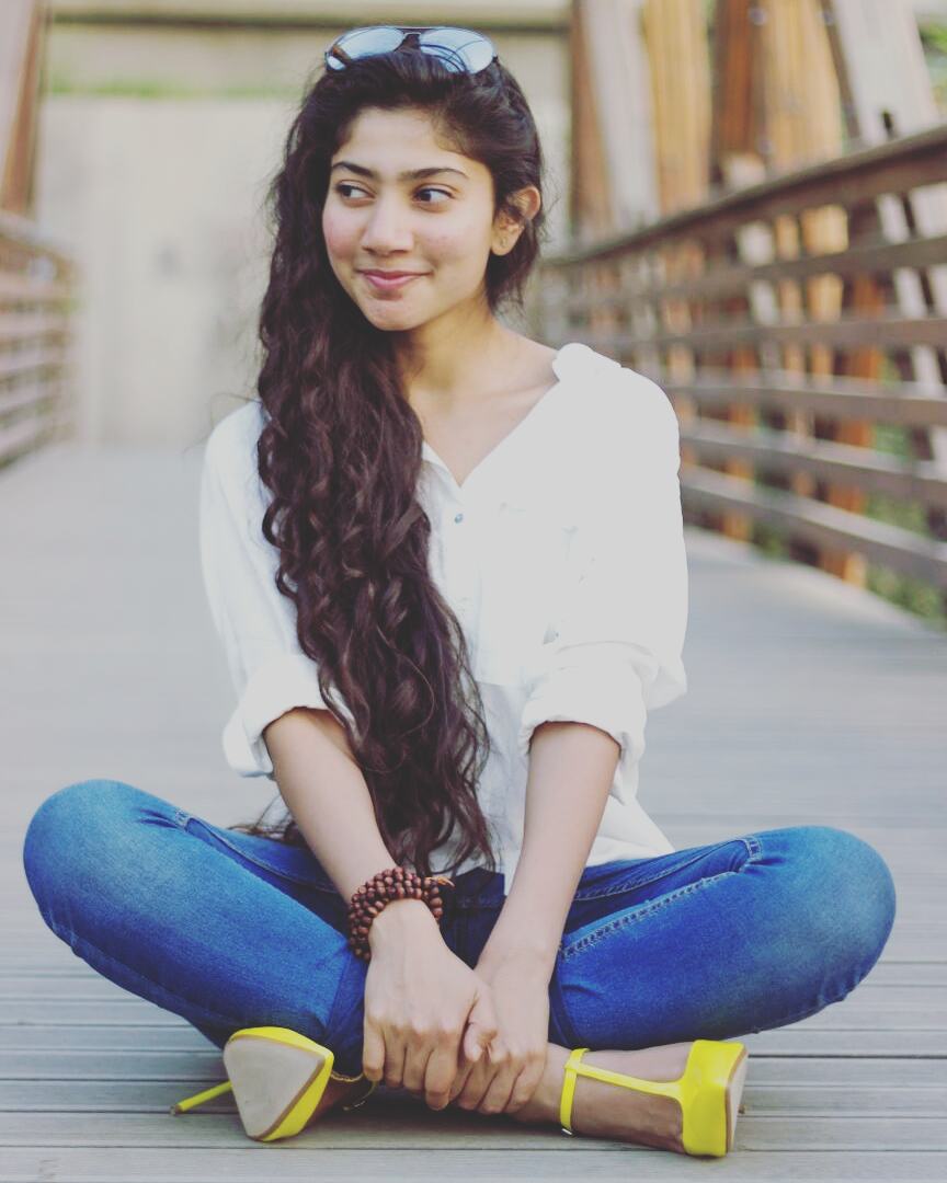 Coral Saree Statement: Sai Pallavi at Temple Event