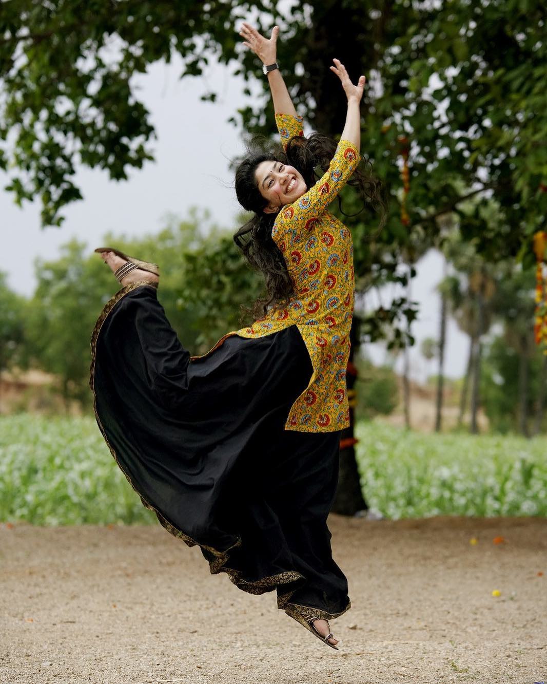 Coral Saree Statement: Sai Pallavi at Temple Event
