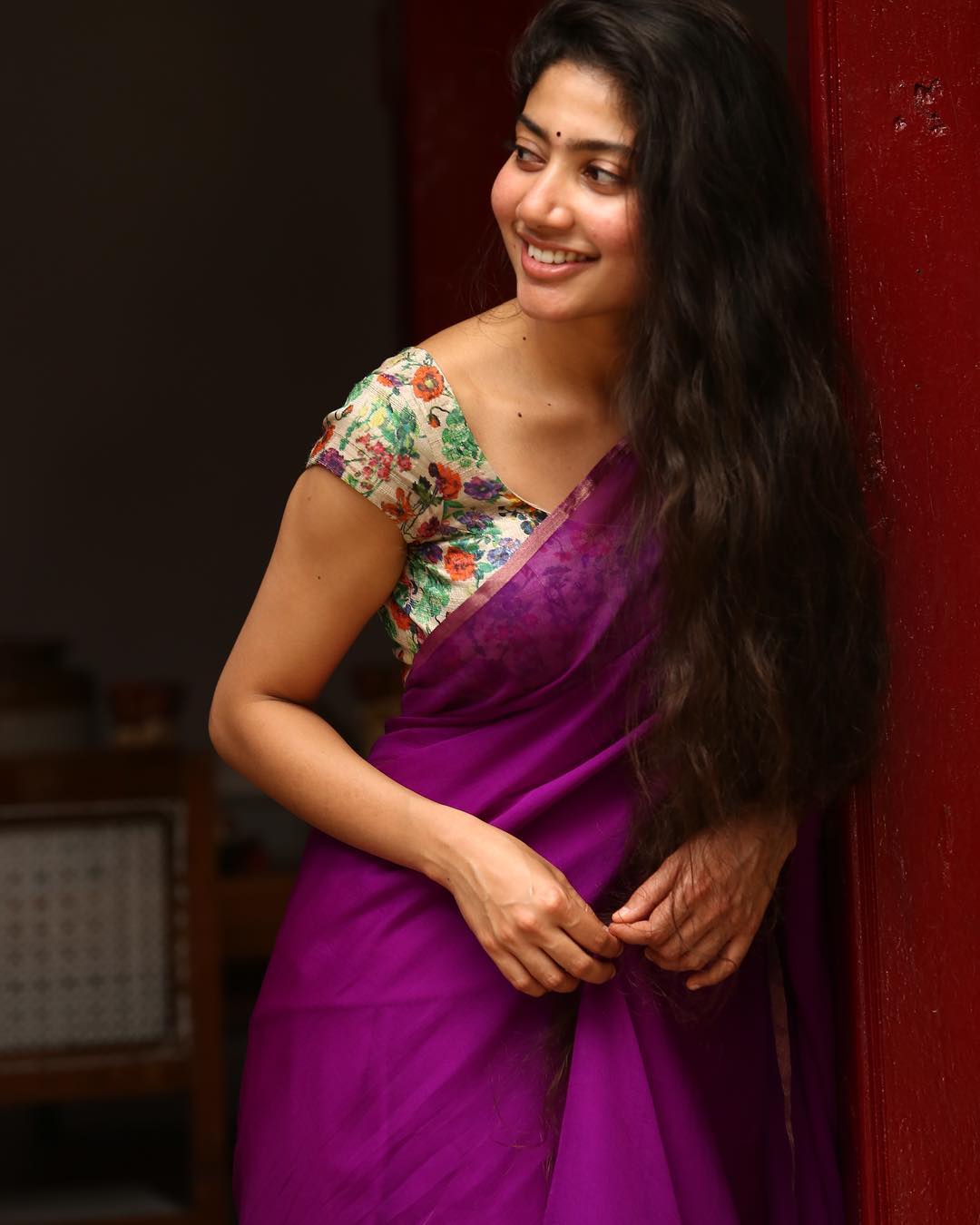Coral Saree Statement: Sai Pallavi at Temple Event