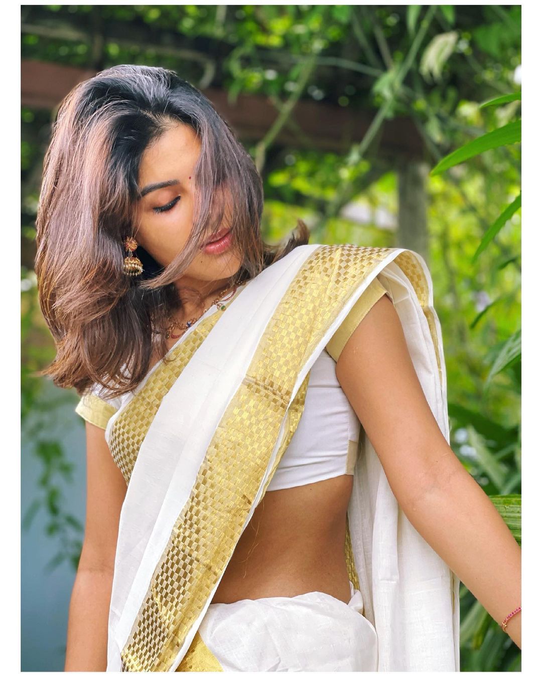 Samyuktha Menon's Golden Radiance: Outdoor Elegance