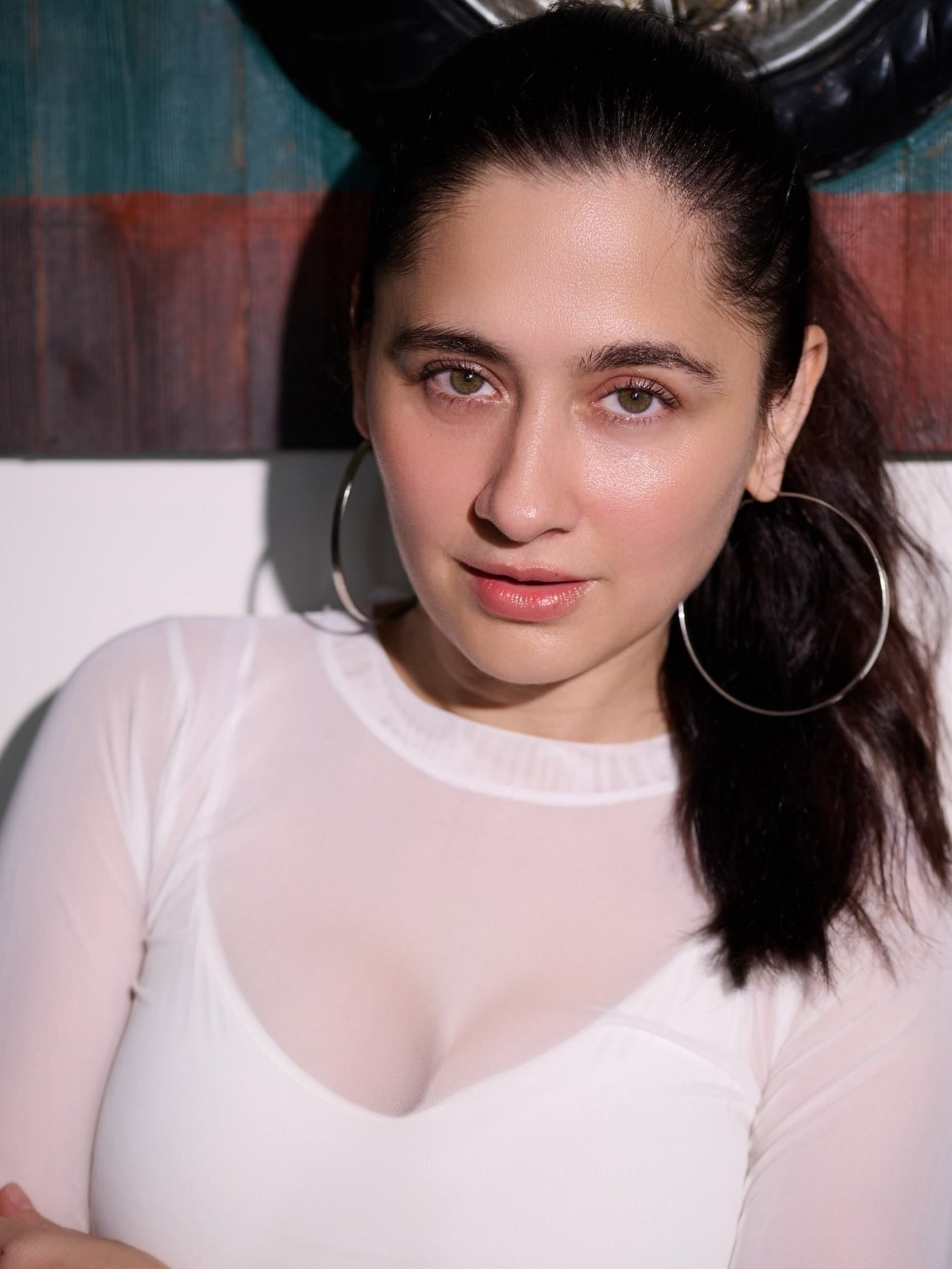 Sanjeeda Shaikh in a white sheer top with a high ponytail. - Photos & Updates