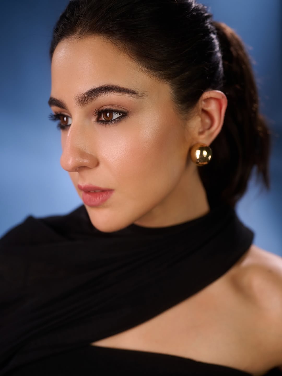 Sara Ali Khan's Draped Elegance: Black & Blue Studio Shots
