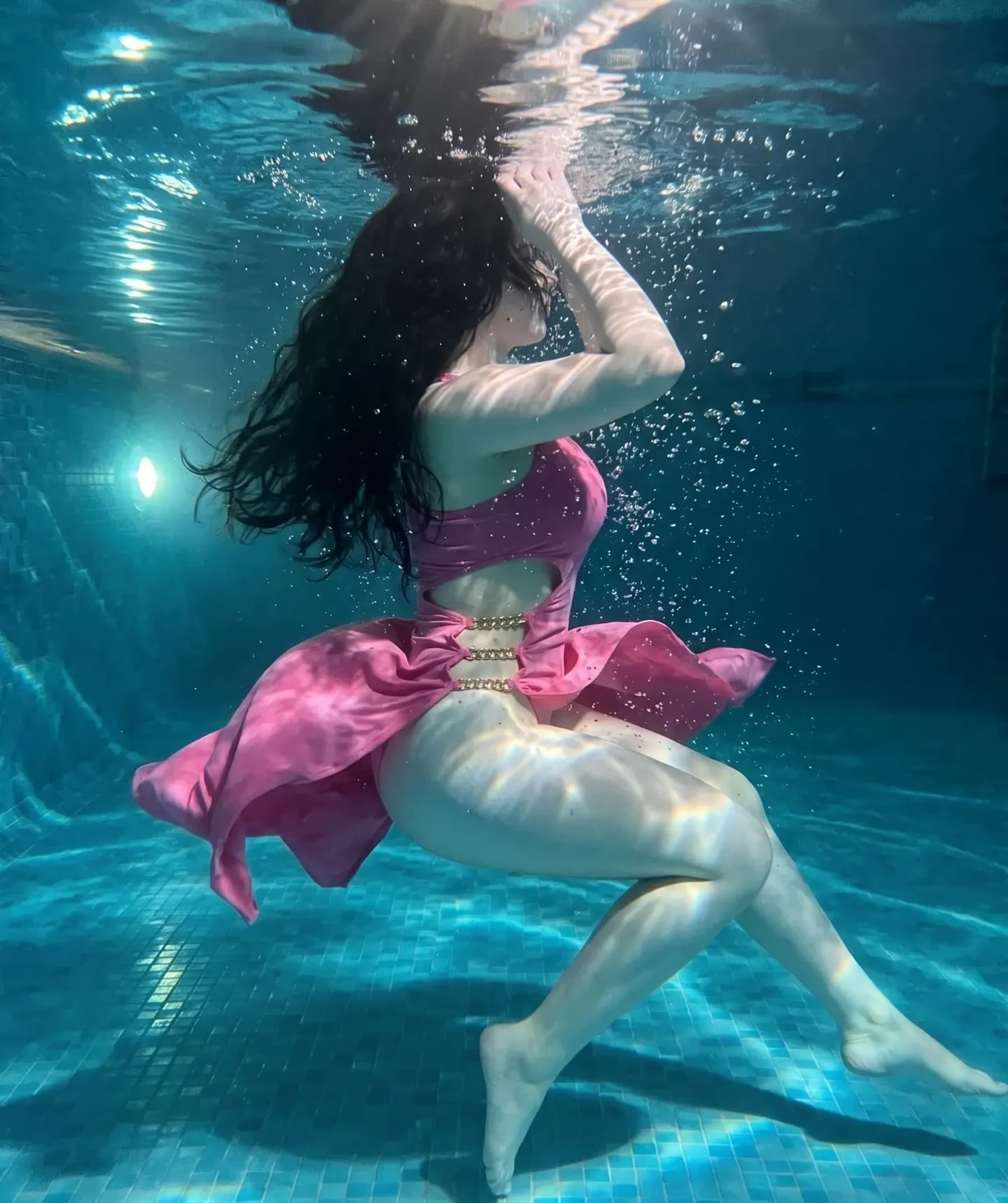 Maaya's Pink Float: An Aquatic Fashion Study