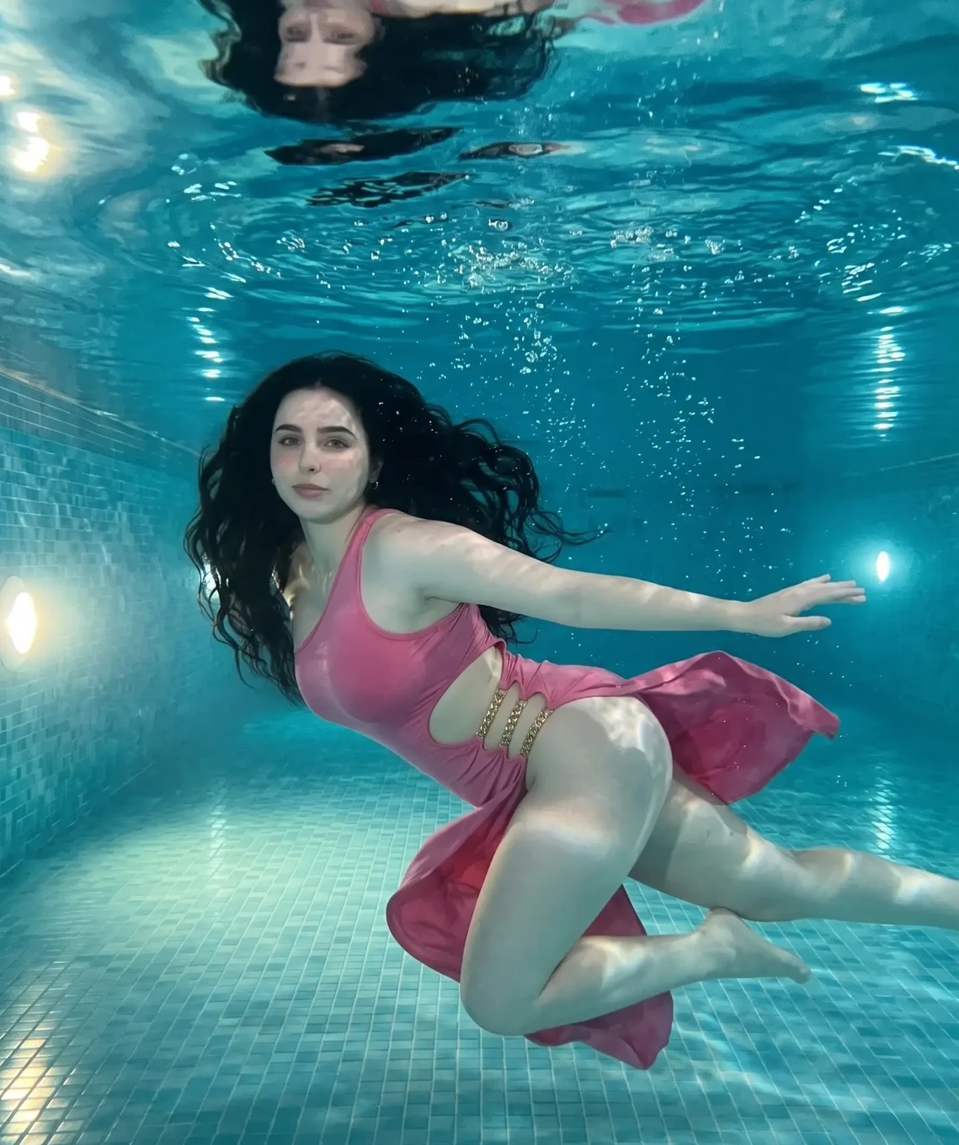 Maaya's Pink Float: An Aquatic Fashion Study