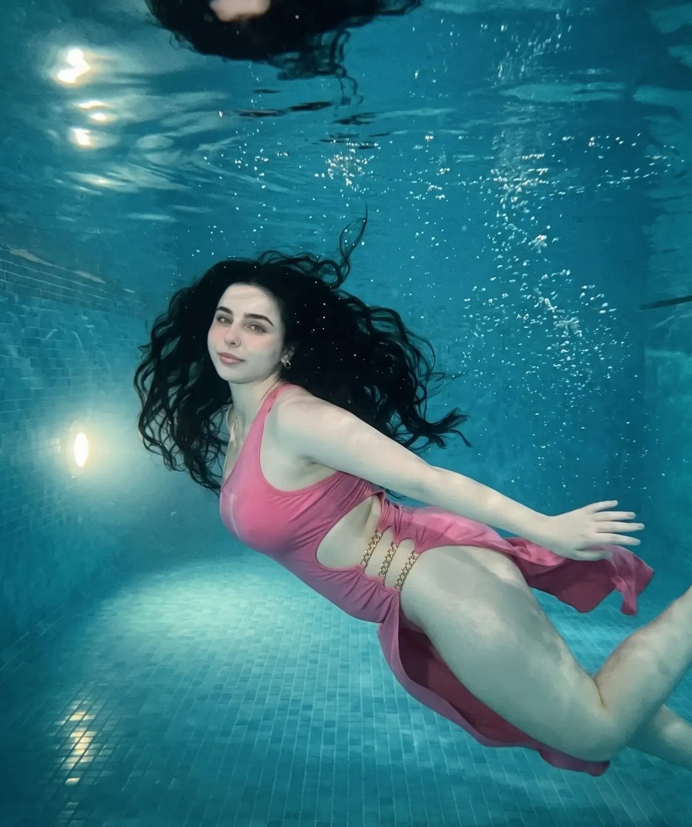 Maaya's Pink Float: An Aquatic Fashion Study