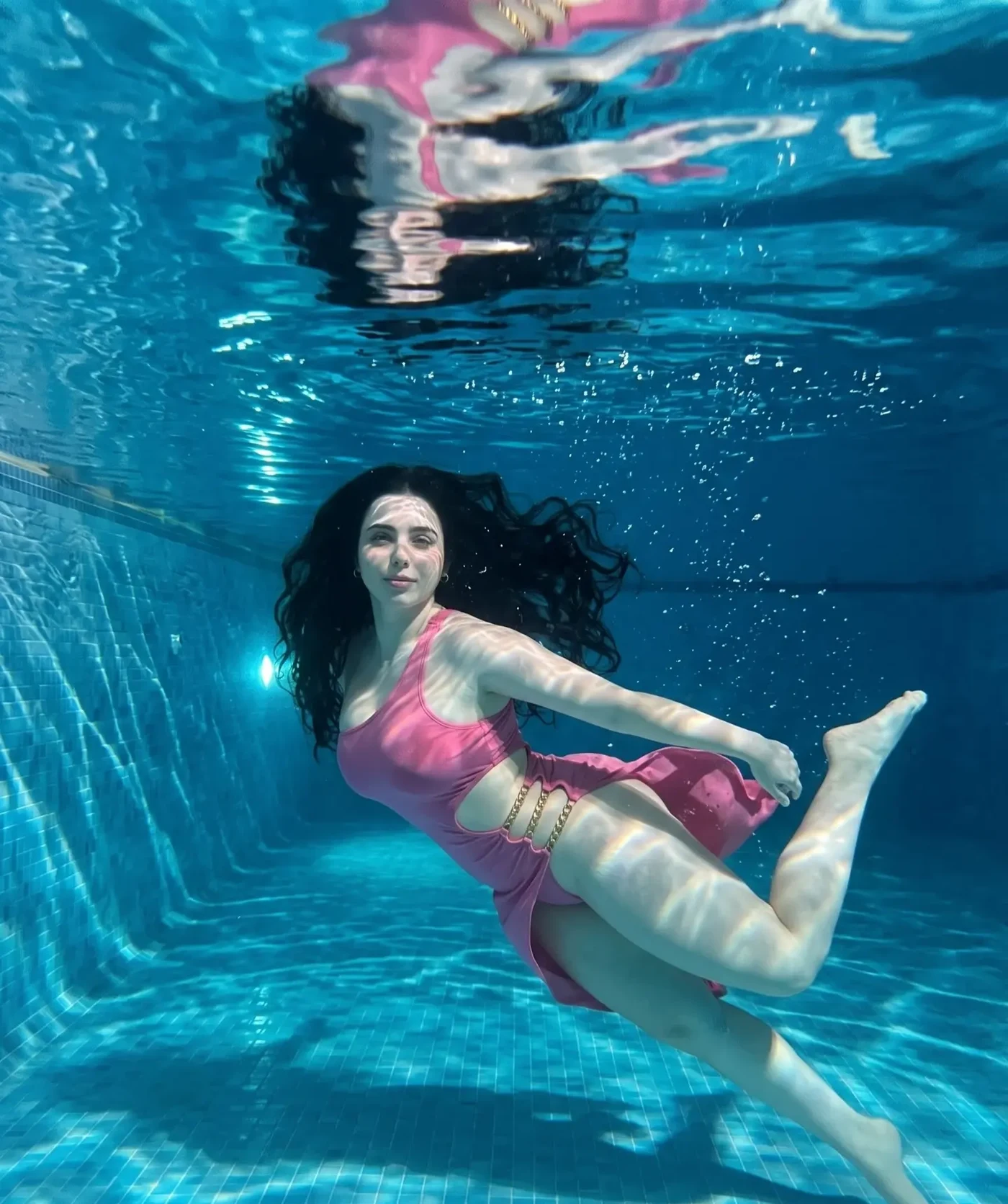 Maaya's Pink Float: An Aquatic Fashion Study