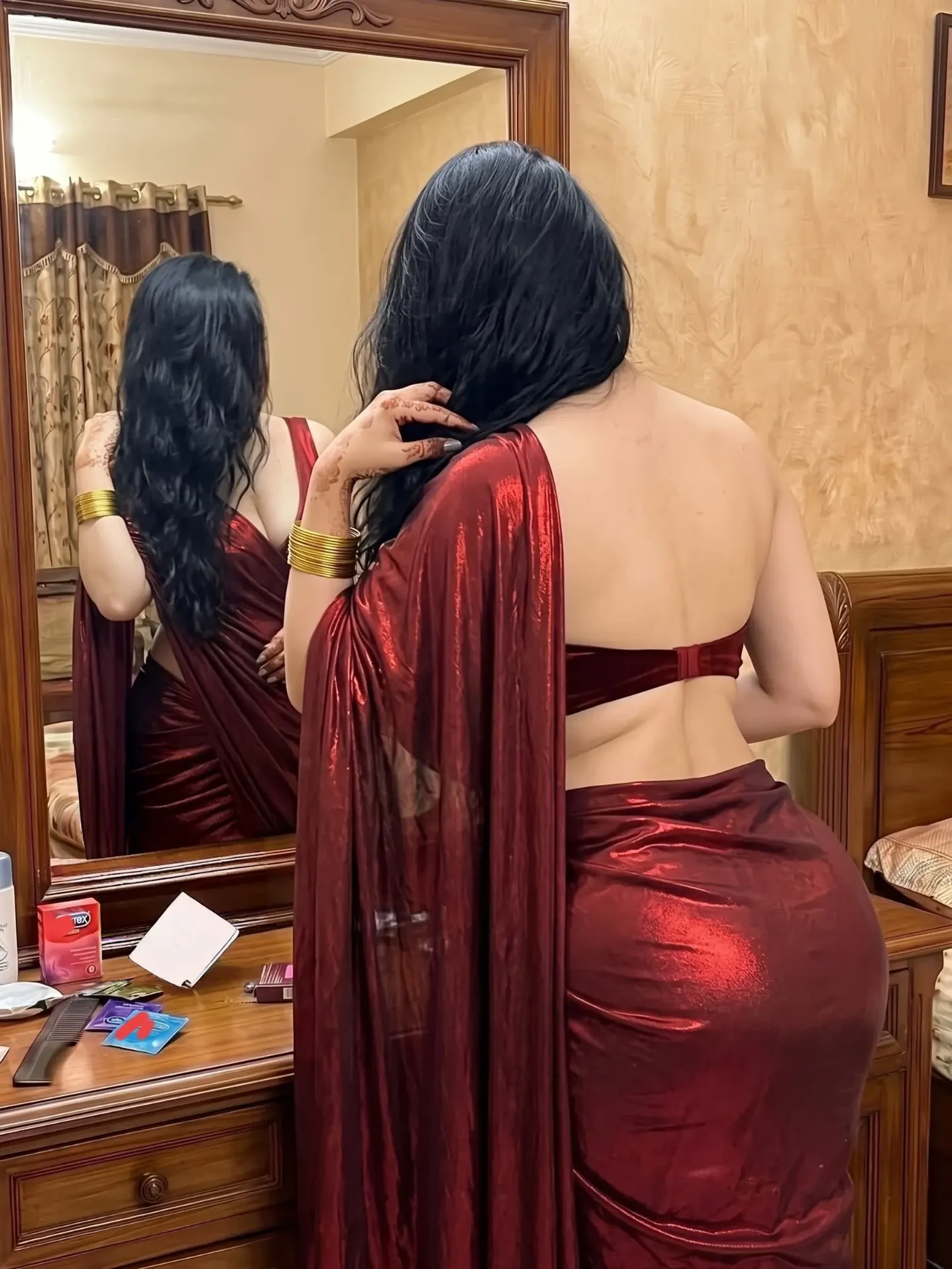 Sassy Maaya Drapes Drama in Deep Crimson Evening Wear