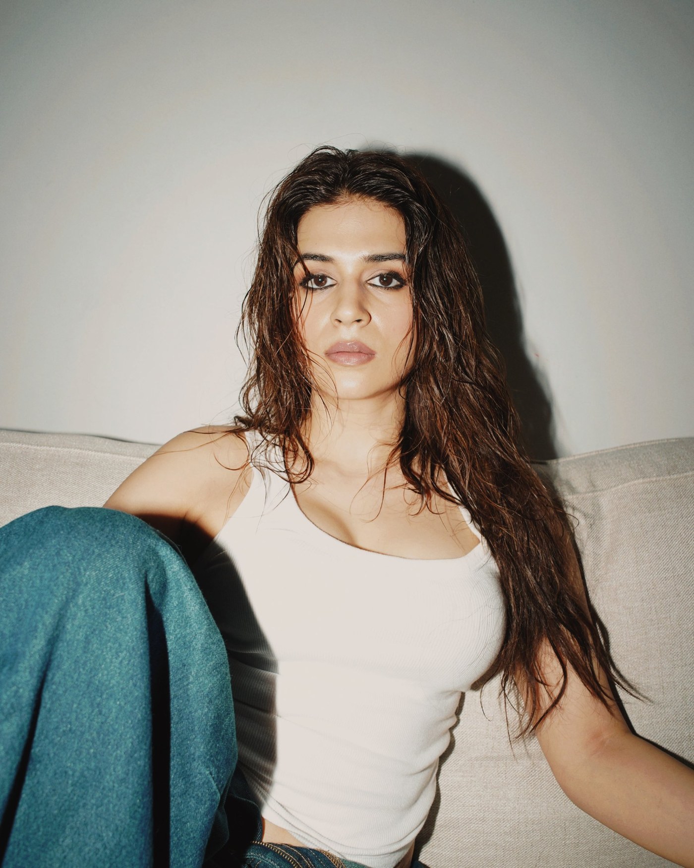 Shraddha Das embodies a fresh, modern aesthetic in a crisp white outfit, radiating effortless confidence.