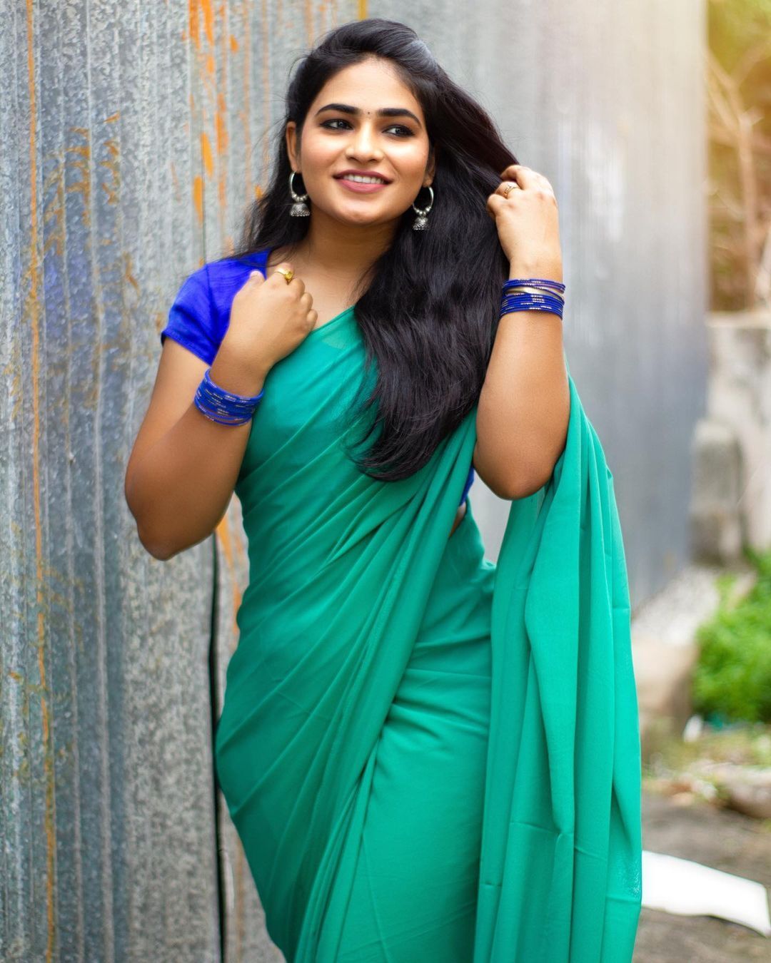 Shruthi Selvam's Stunning Red & Saffron Look