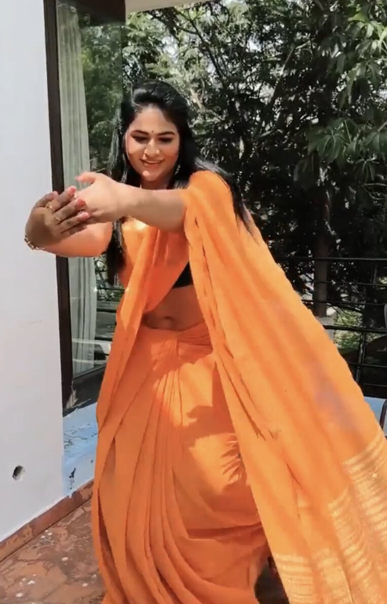 Shruthi Selvam's Stunning Red & Saffron Look