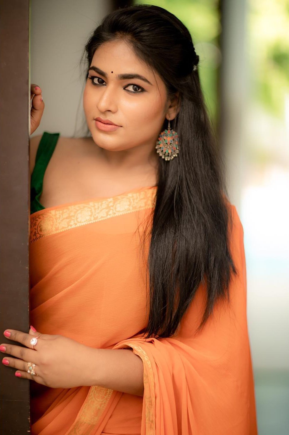 Shruthi Selvam's Stunning Red & Saffron Look