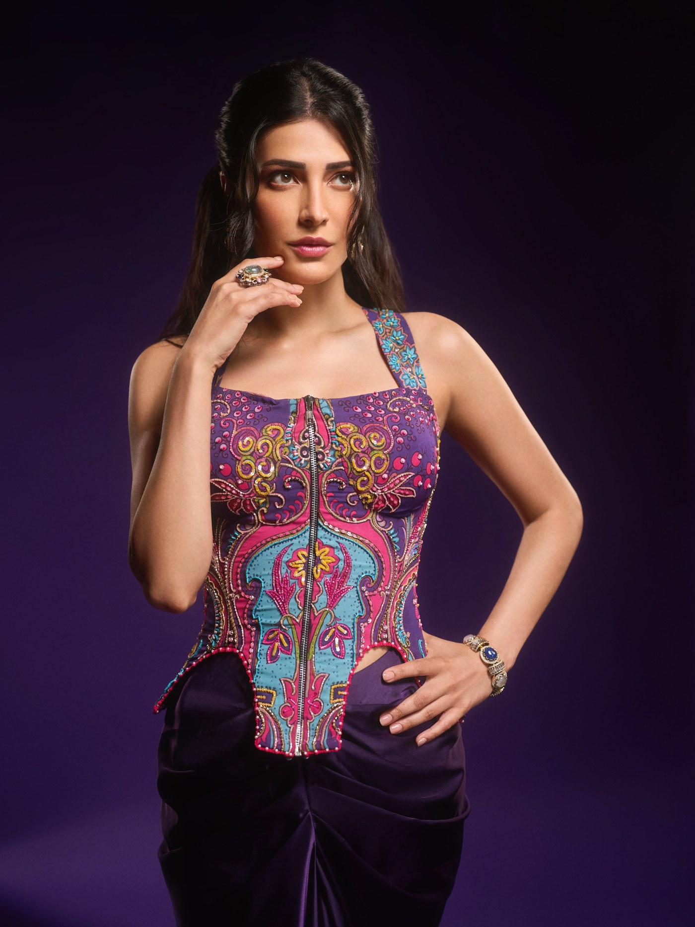 Shruti Haasan showcases a captivating blend of vibrant Indian craftsmanship and modern rock-star edge at the event.
