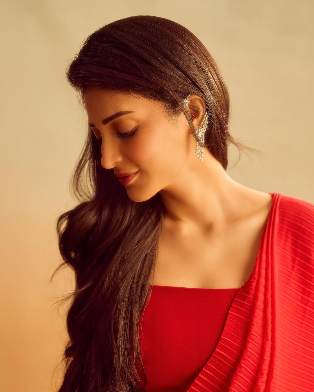 Shruti Haasan's Red Radiance: A Photo Gallery