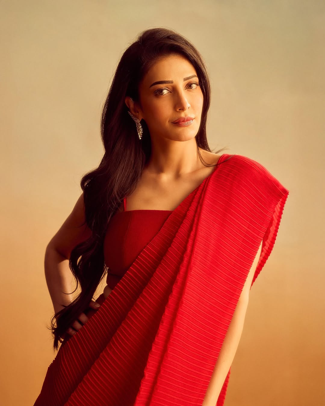 Shruti Haasan's Red Radiance: A Photo Gallery
