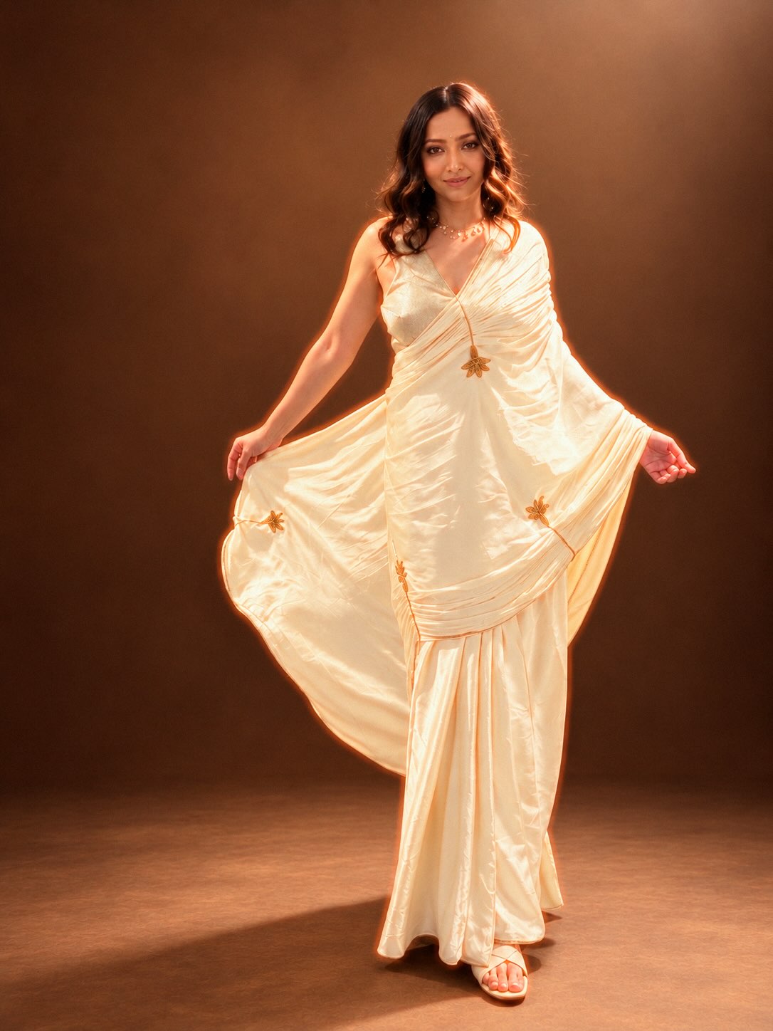 Shweta Basu Prasad in a flowing cream saree with gold embroidery. - Photos & Updates