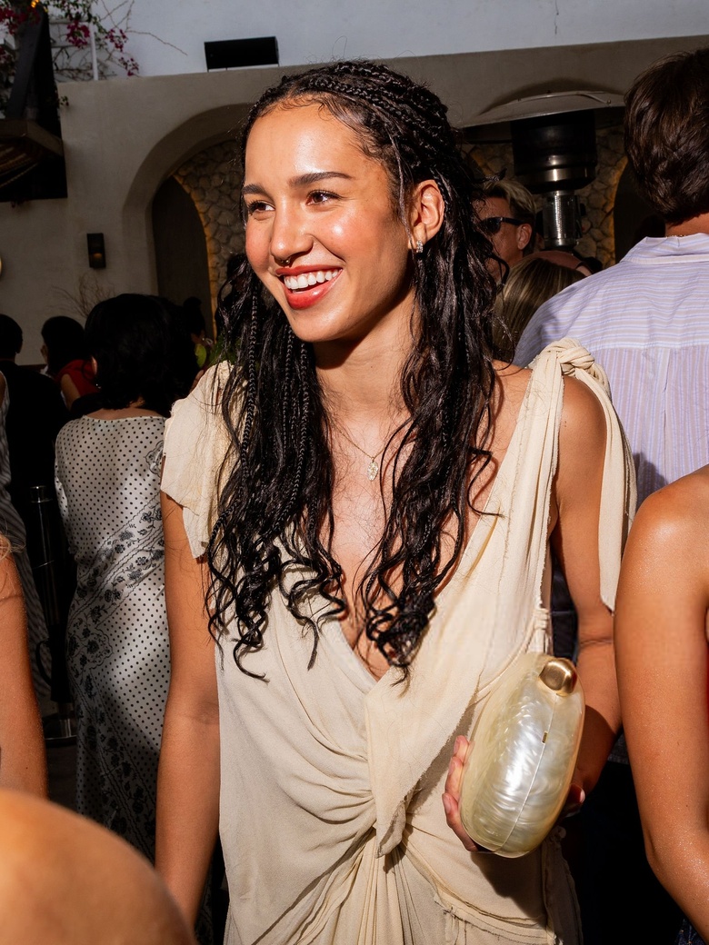 Sofia Wylie smiles and poses while attending the Netflix End of Summer Bash at LAYLA Restaurant in Los Angeles. - Photos & Updates